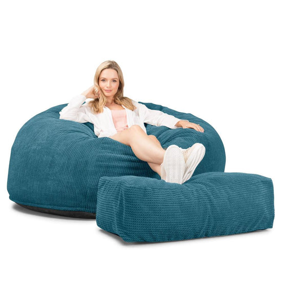 Lounge Pug, CloudSac 1010 XXL, Riesen Memory- Schaum XXL Sitzsacksofa, Schlafsofa, Pom-Pom Türkis