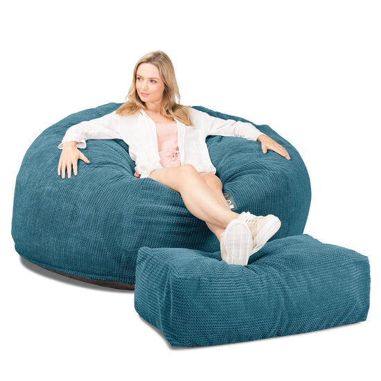 Lounge Pug, CloudSac 1010 XXL, Riesen Memory- Schaum XXL Sitzsacksofa, Schlafsofa, Pom-Pom Türkis
